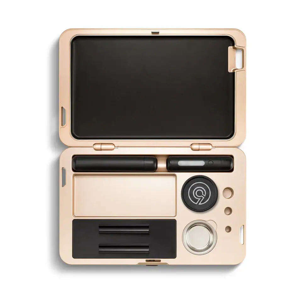 Open M.L.T.9 Portable Rolling Tray Survival Kit showing its smooth aluminum rolling surface, organized storage compartments, and compact travel-friendly design, styled as a premium on-the-go cannabis accessory.