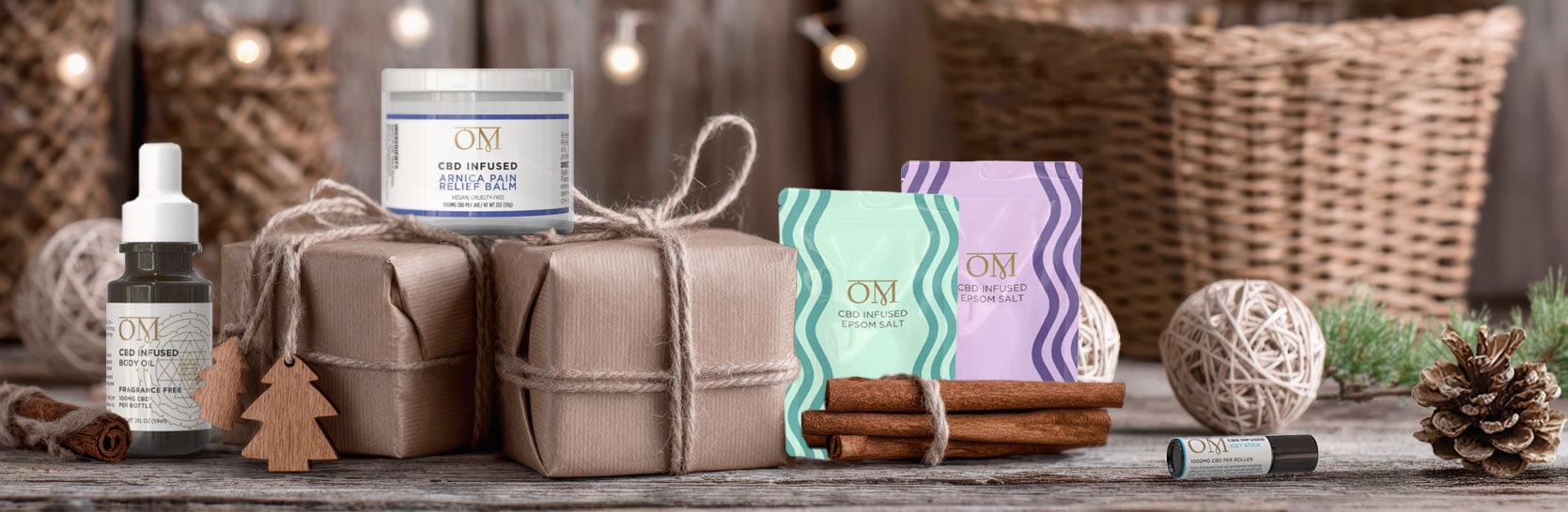 CBD wellness products, including infused bath salts, topical balms, and oils styled with wrapped gifts and natural holiday décor.